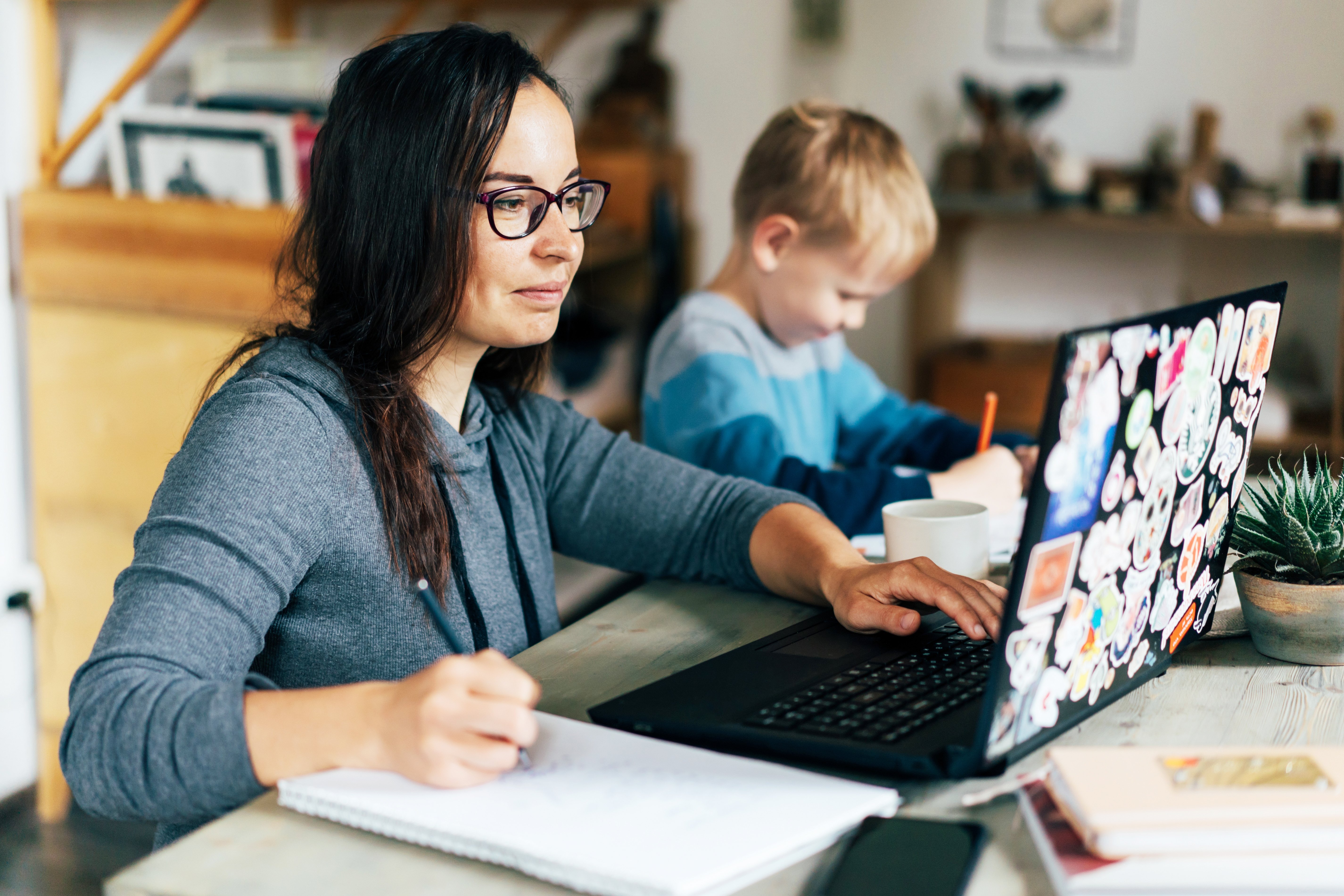 woman working with her son 
