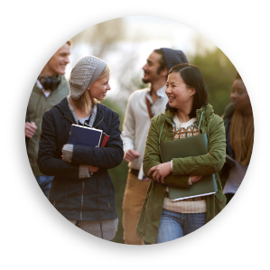 Diverse students carrying books and walking 