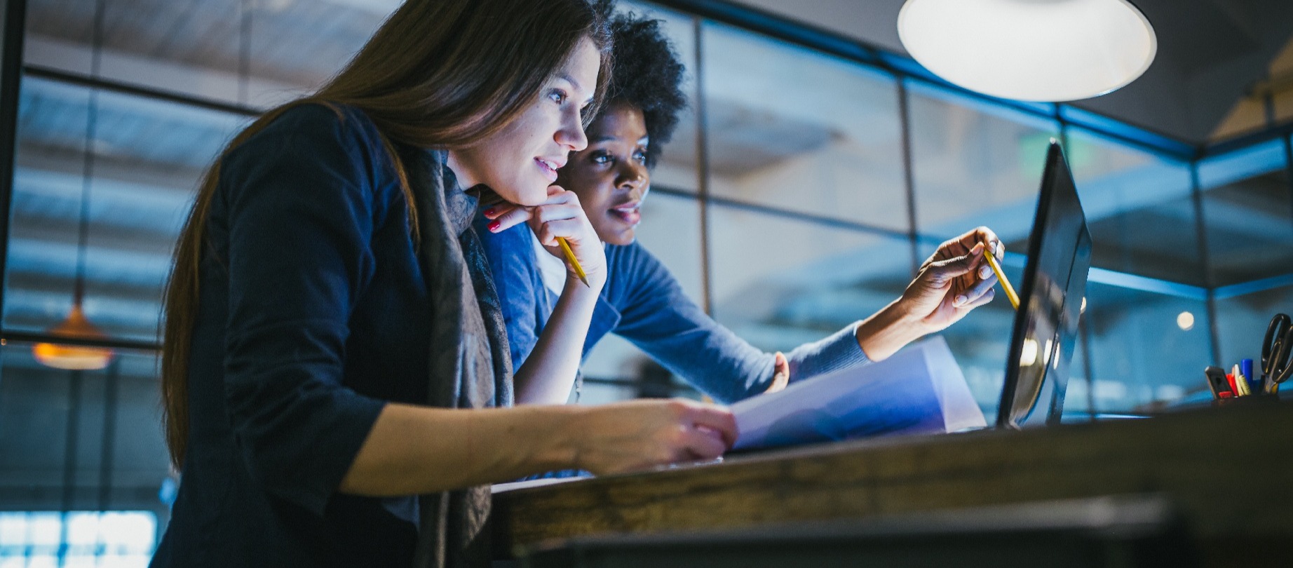 Women working in front of a computer