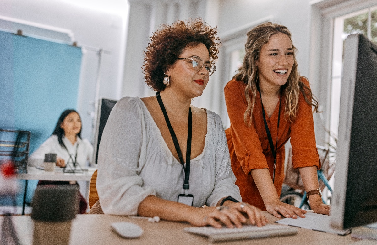Pair of women in front of the computer 