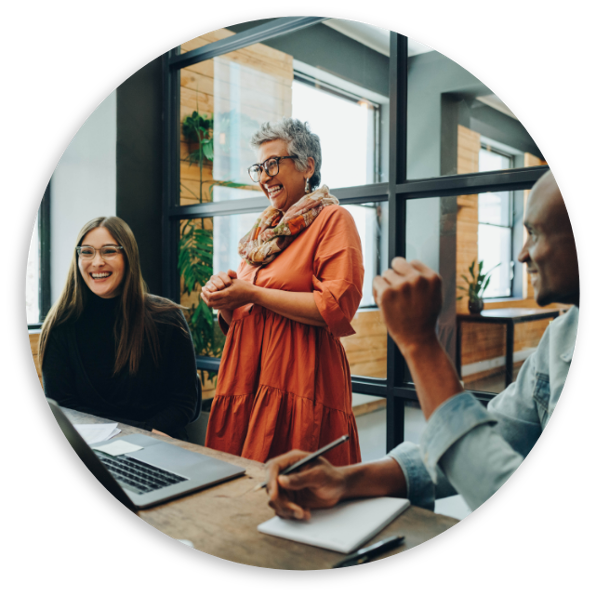 People in office smiling 